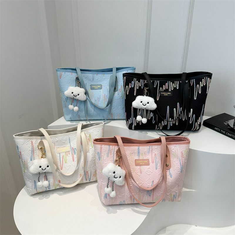 Sac fourre-tout nouveau style, sac à bandoulière de travail à texture pendentif simple et mignon  en nylon imperméable présente un motif gaufré et un porte-clés en forme de nuage.